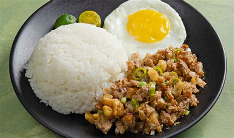 sizzling porkchop with rice|Pork Sisig Garlic Rice .